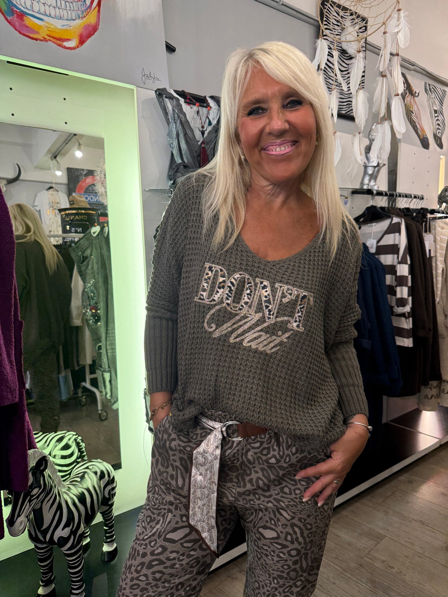 Pull torsade taupe