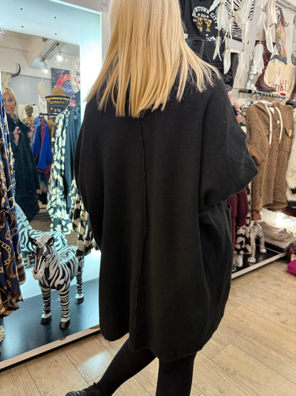 Veste pompon noire réassort arrivé