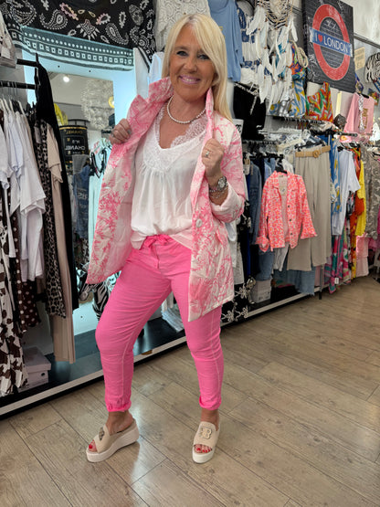 Pantalon magique rose fluo