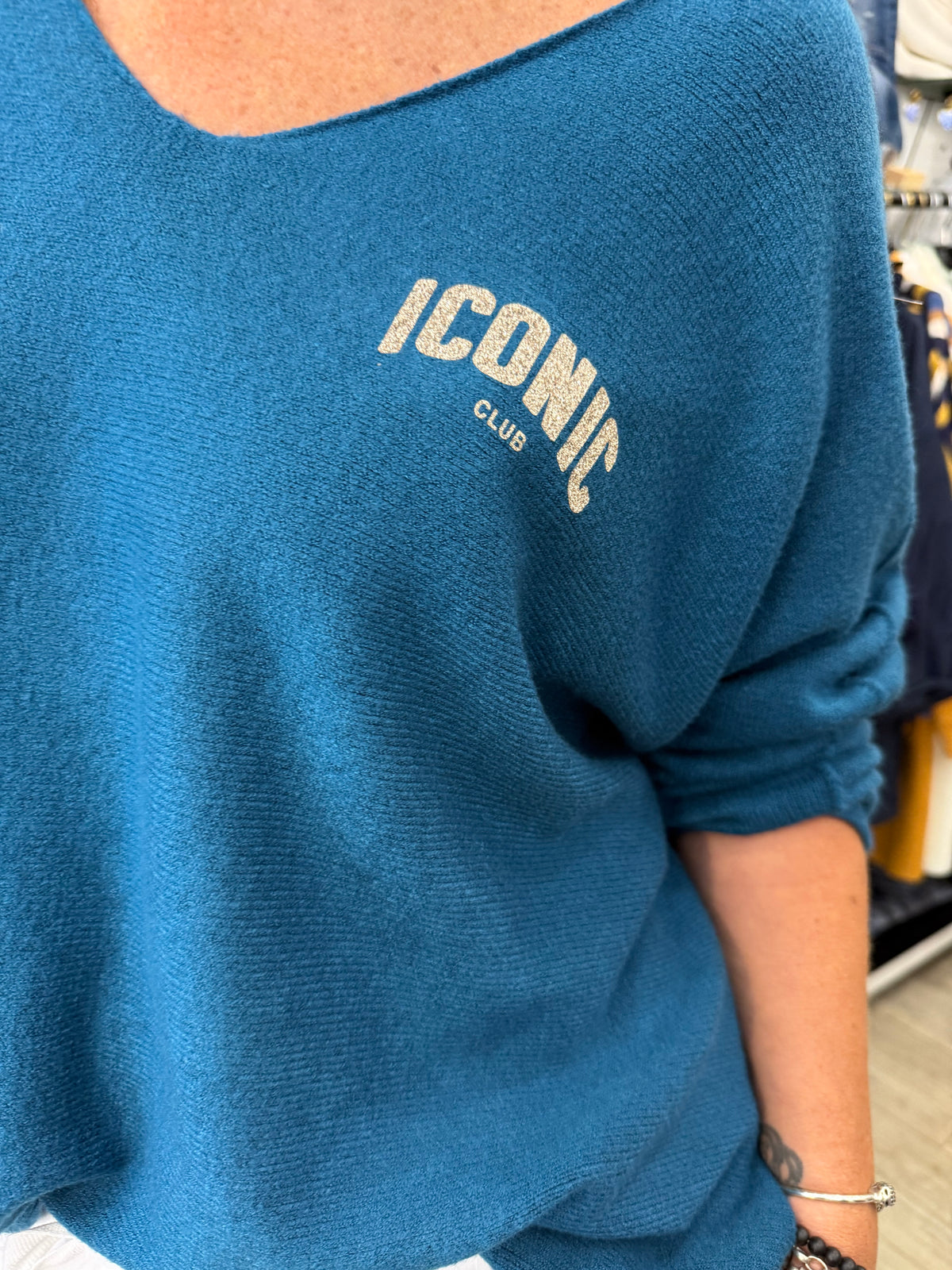 Pull iconic bleu pétrole