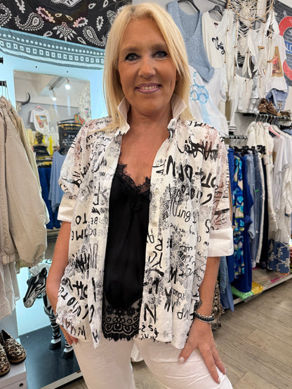 Chemise noire blanche brodée